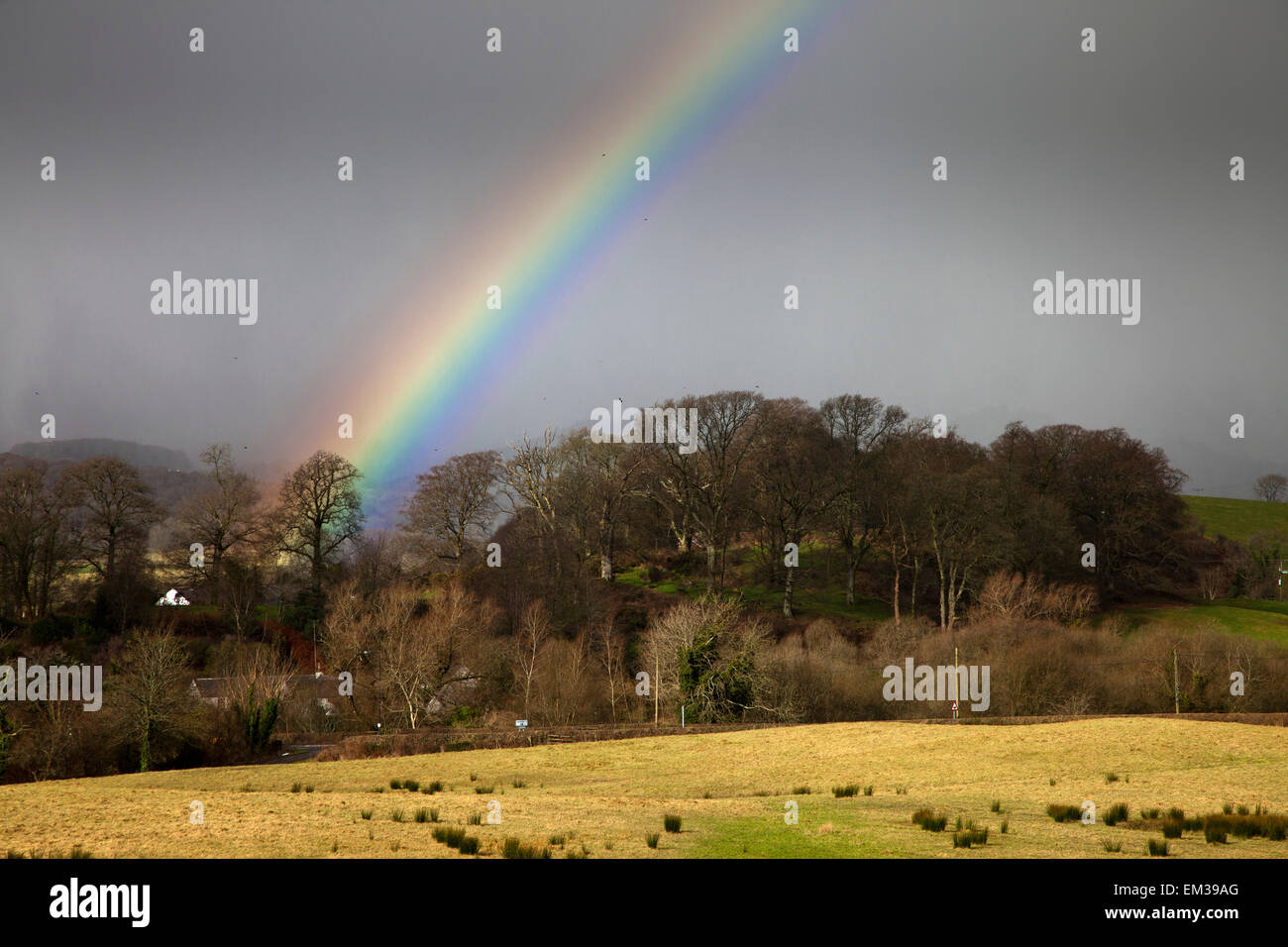 Rainbow against dark skies hi-res stock photography and images - Alamy