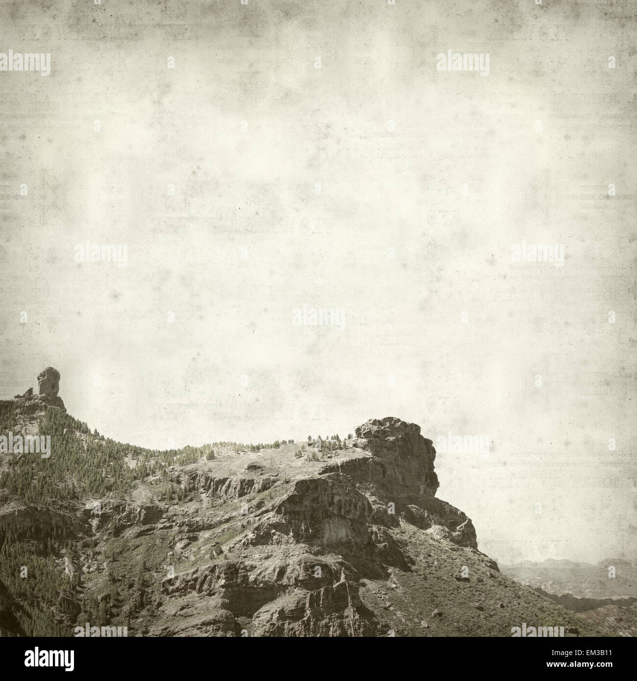 textured old paper background with Landscape of Gran Canaria, Roque Nublo volcanic plug rock