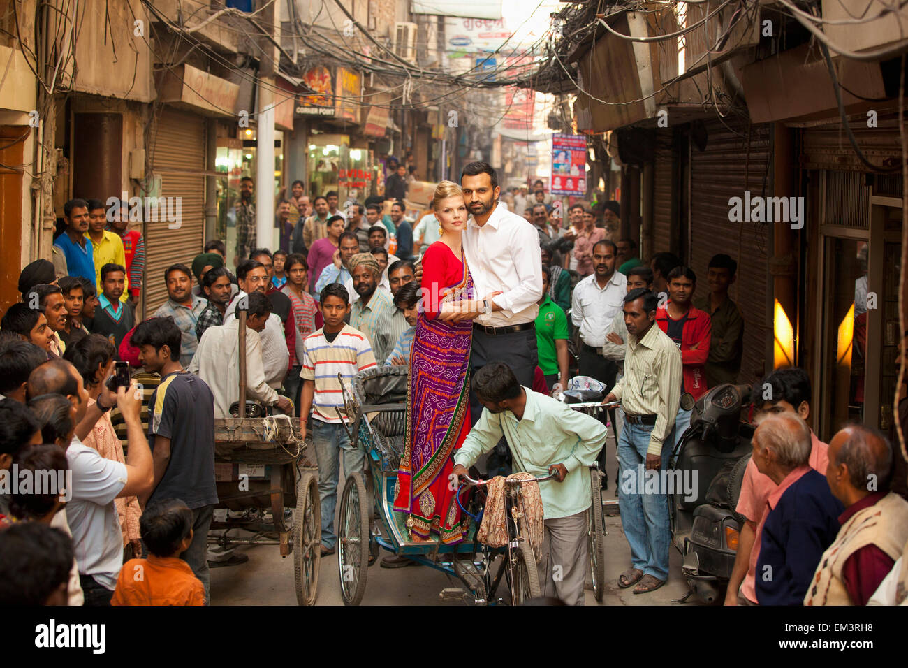 A Couple Standing And Posing In A Cycle Rickshaw; Ludhiana, Punjab, India Stock Photo