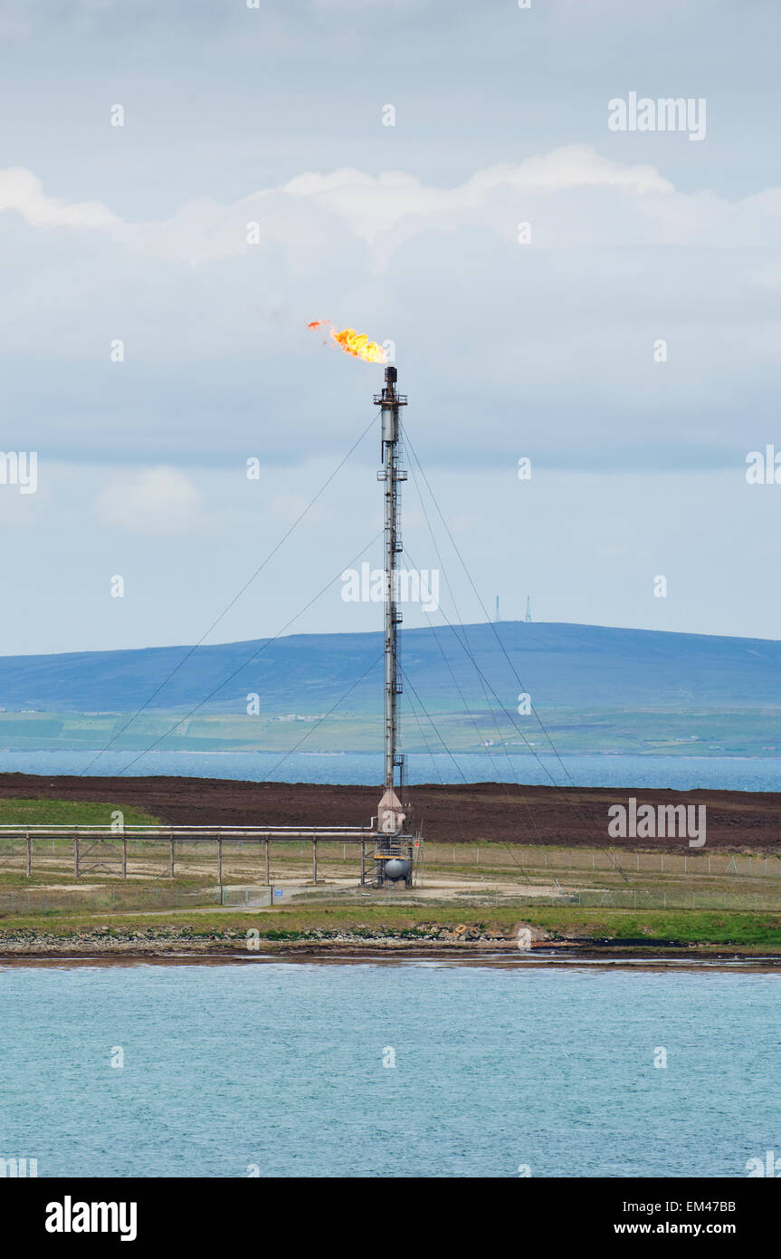 Smoke stack at the Flotta Oil Terminal on the island of Flotta in the Orkney Islands, Scotland. Stock Photo