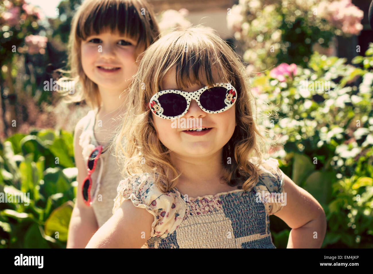 siblings, light, green, blonde brown hair, smiling, happy bokeh, face pulling, forest , funny, shocked, sunglasses, heart Stock Photo