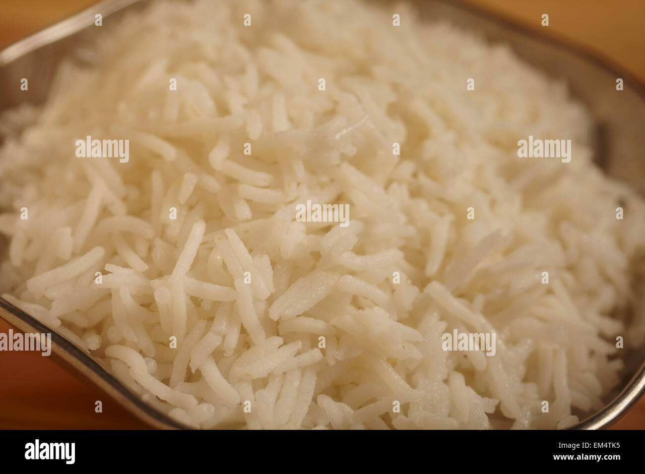 a serving of cooked, plain white basmati rice Stock Photo Alamy