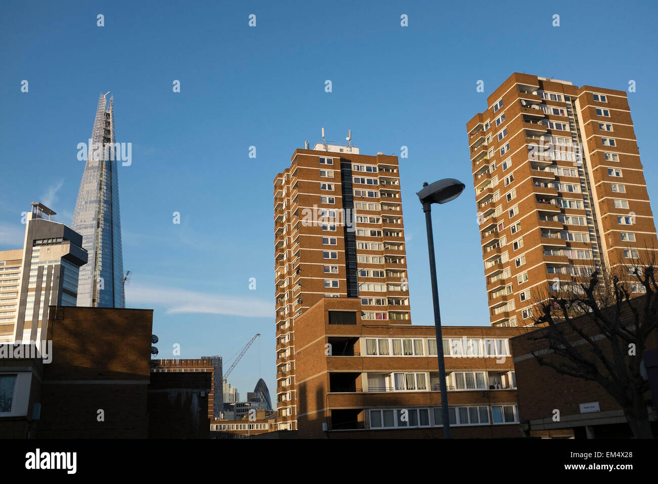 The Shard towering over a council housing estate in Southwark, London