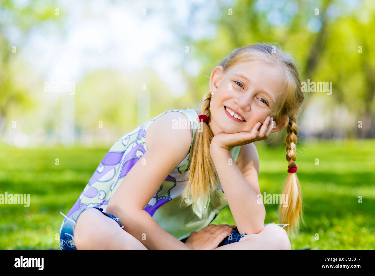 portrait of a girl in a park Stock Photo - Alamy