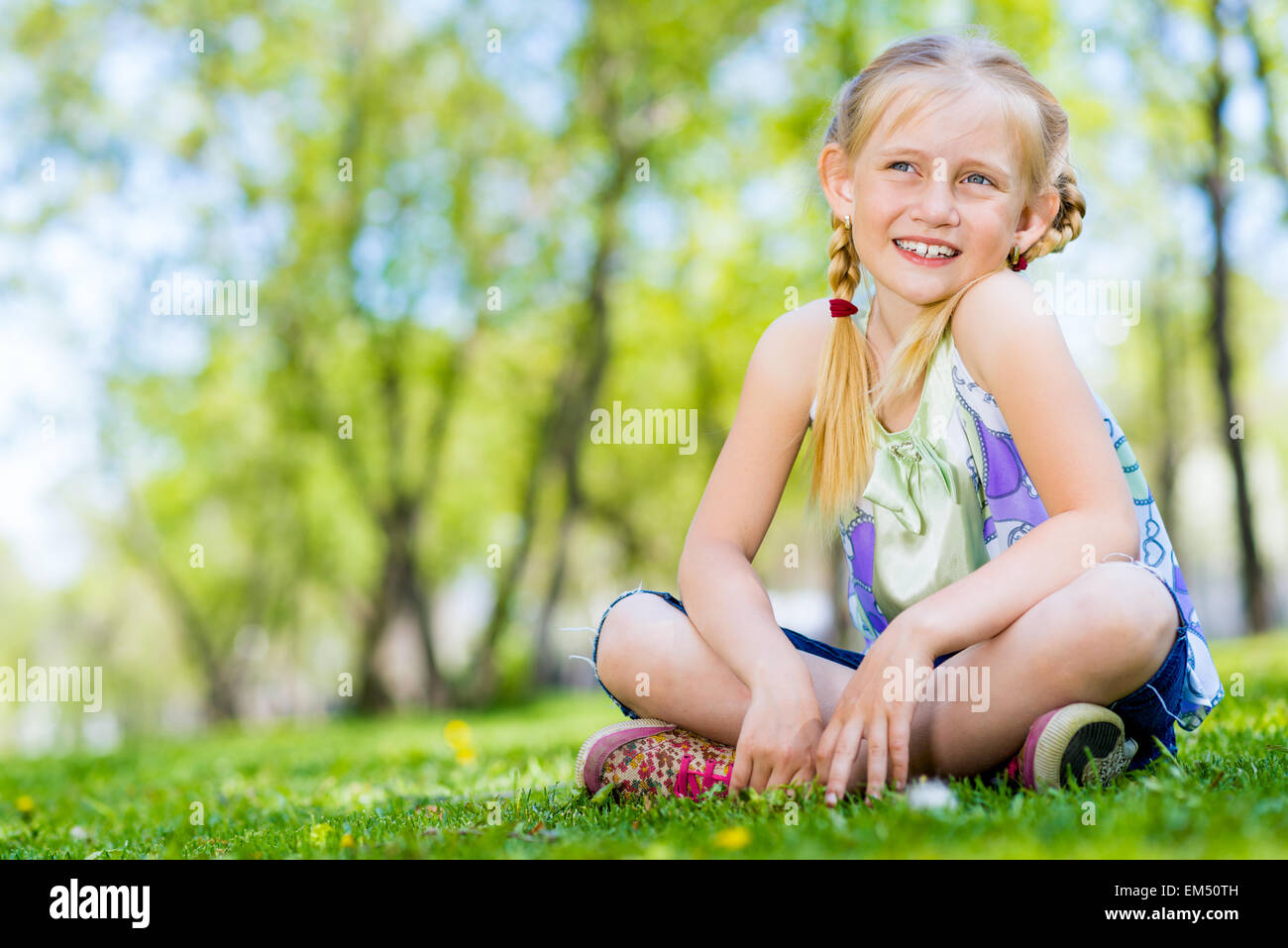 portrait of a girl in a park Stock Photo - Alamy