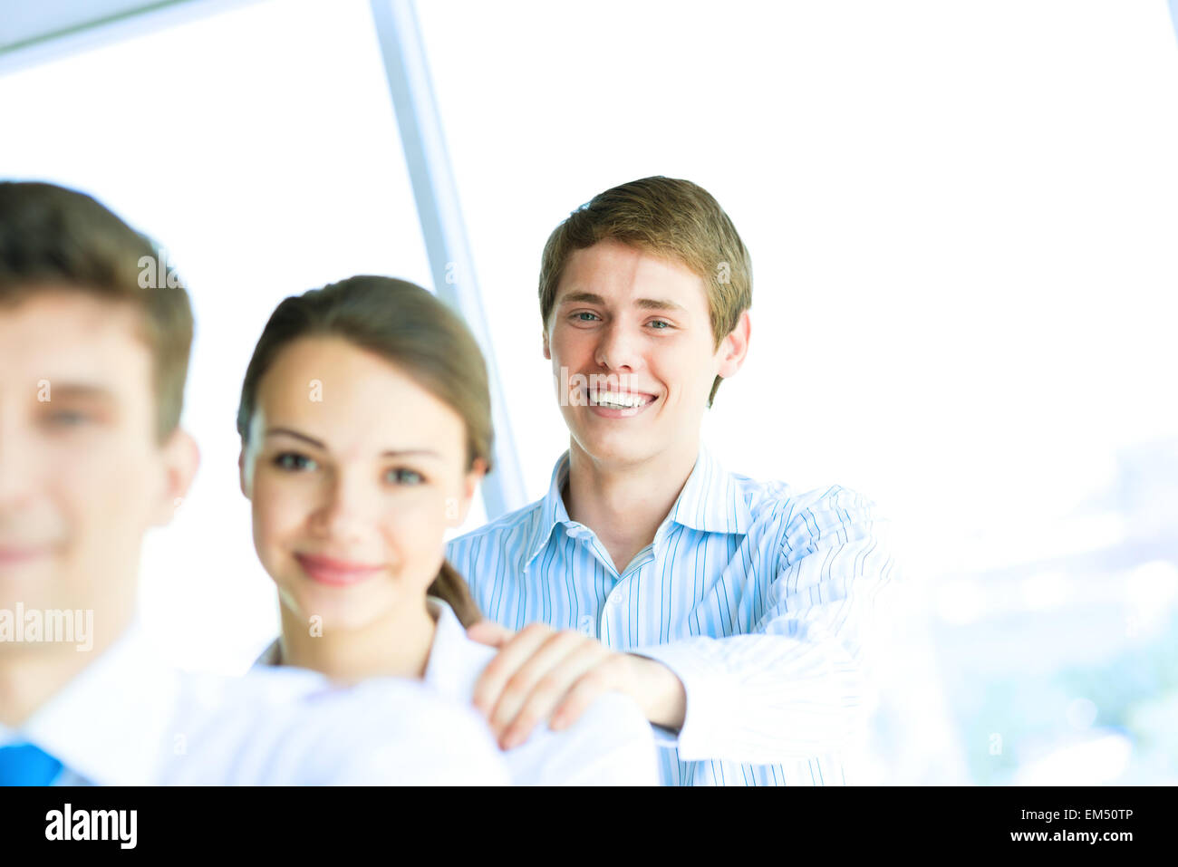 Teamwork smile portrait young hi-res stock photography and images - Alamy