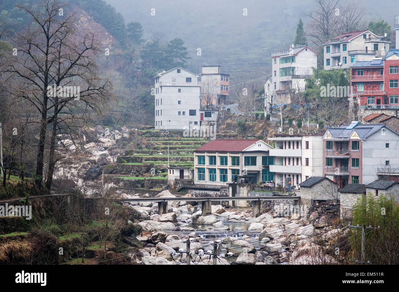 Chinese traditional dwellings along the riverside Stock Photo