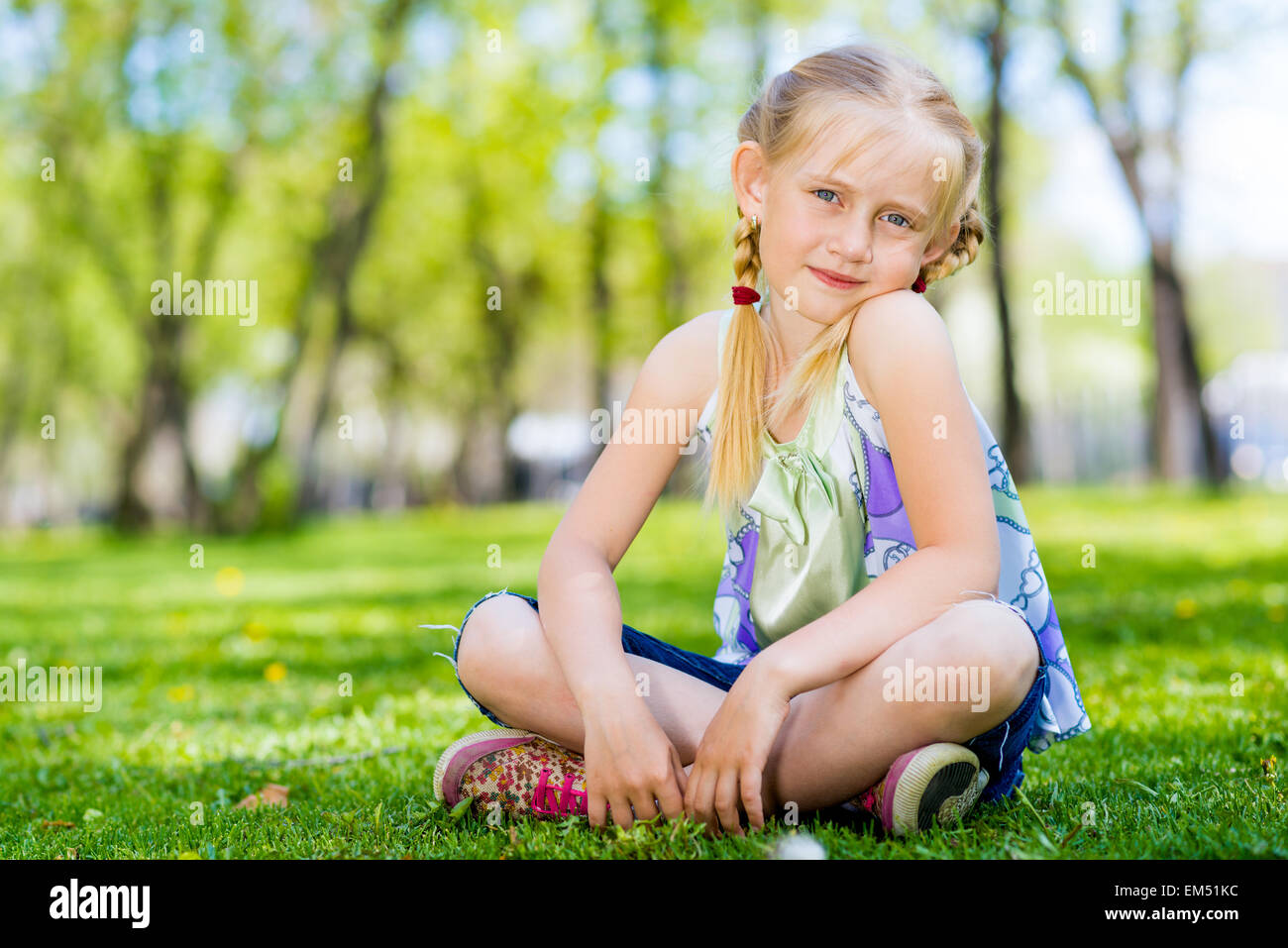 portrait-of-a-girl-in-a-park-stock-photo-alamy