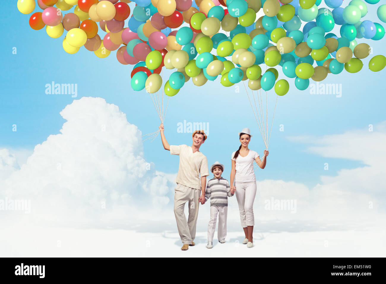 Happy young family Stock Photo - Alamy