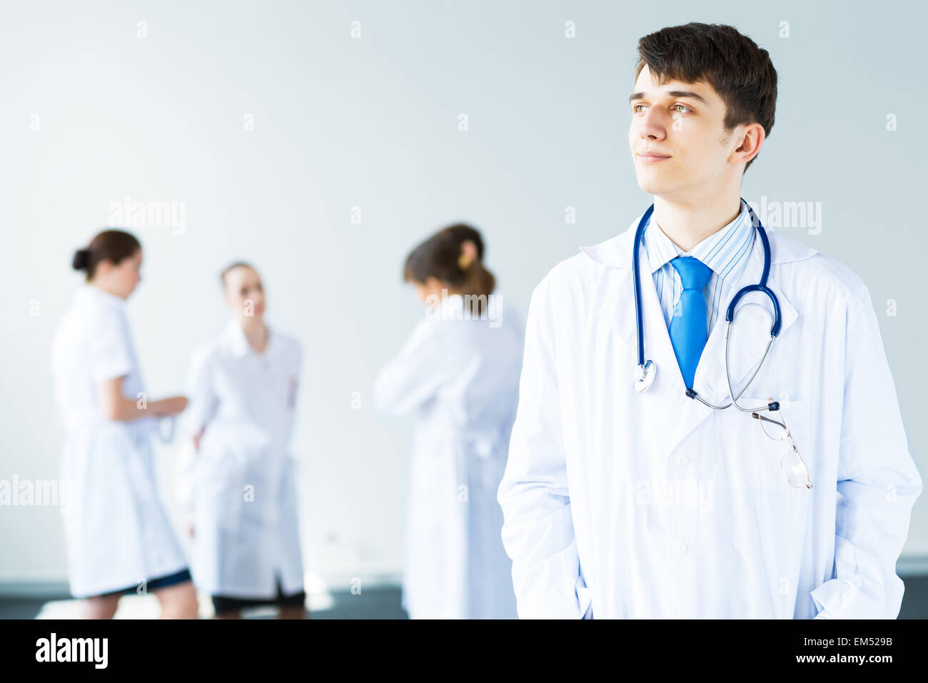 portrait of successful young doctor Stock Photo - Alamy