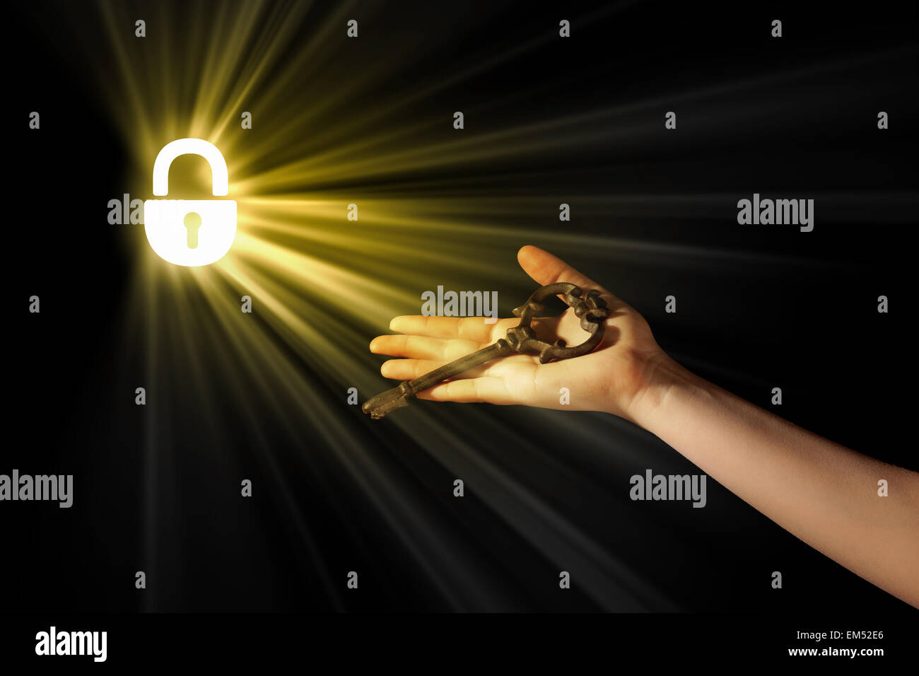Hand with key Stock Photo - Alamy