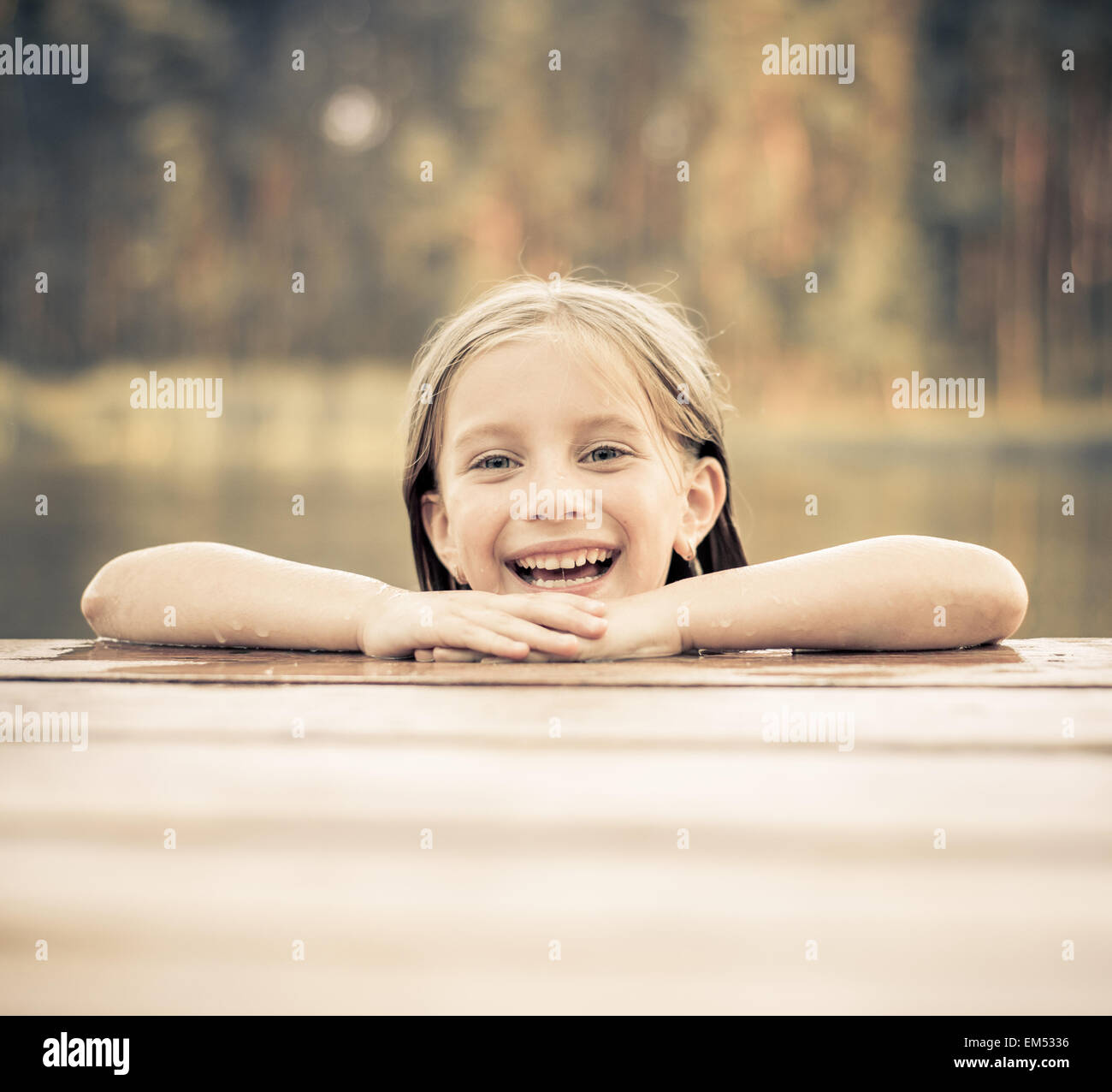 little girl in the river Stock Photo Alamy