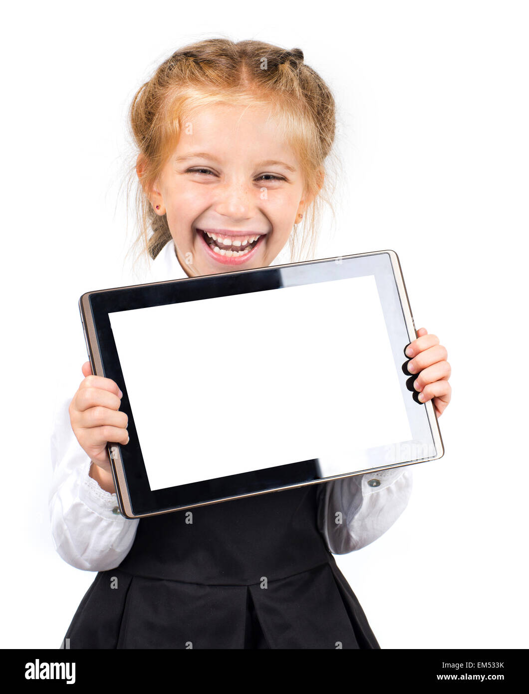 cute schoolgirl with a pc tablet Stock Photo