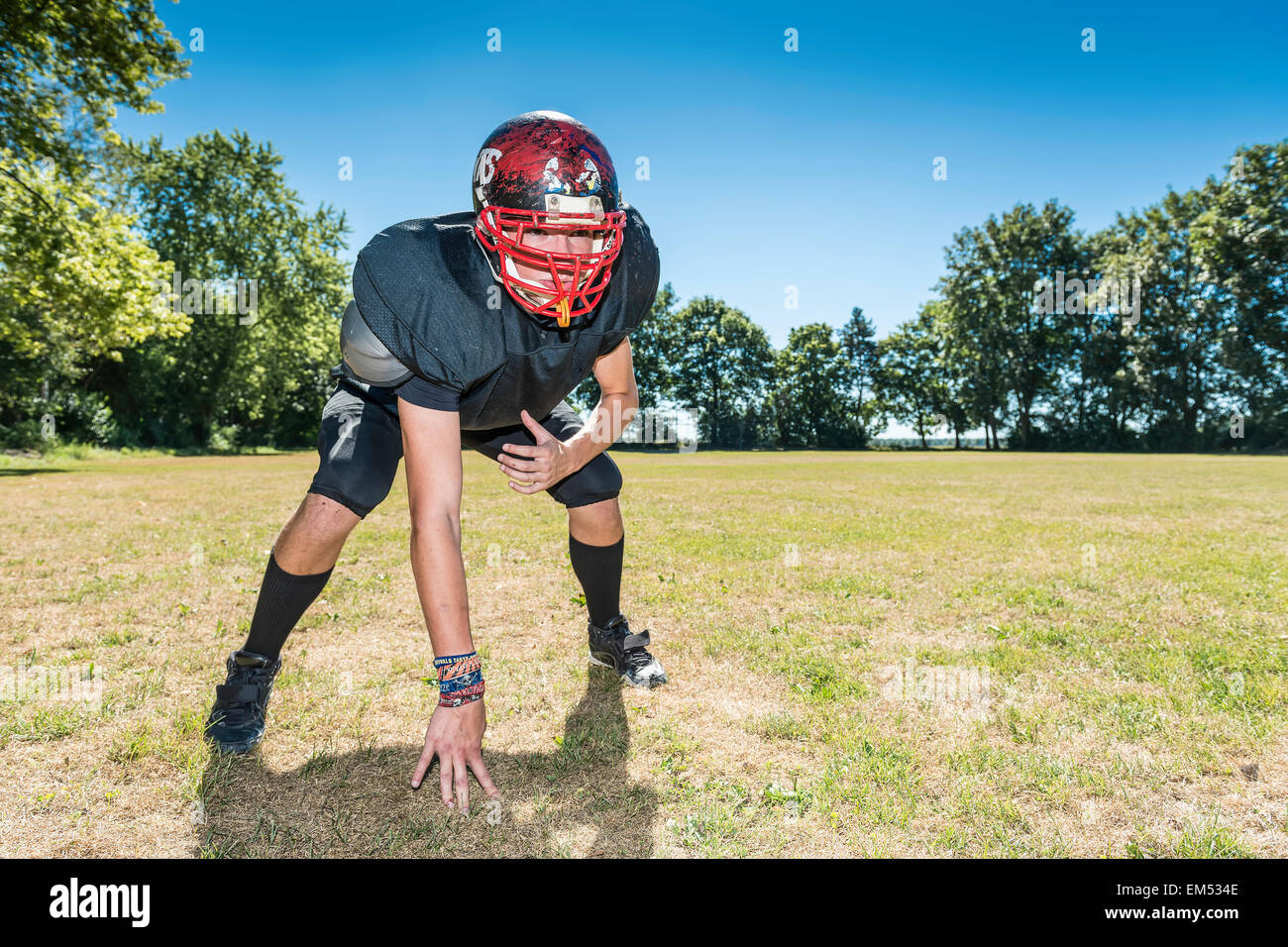 American Football Offensive Lineman in action Stock Photo - Alamy