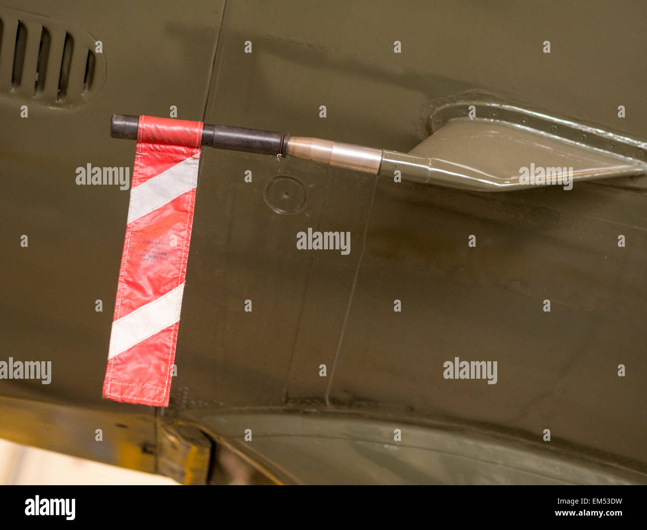 Remove Before Flight tag on a parked aircraft Stock Photo - Alamy