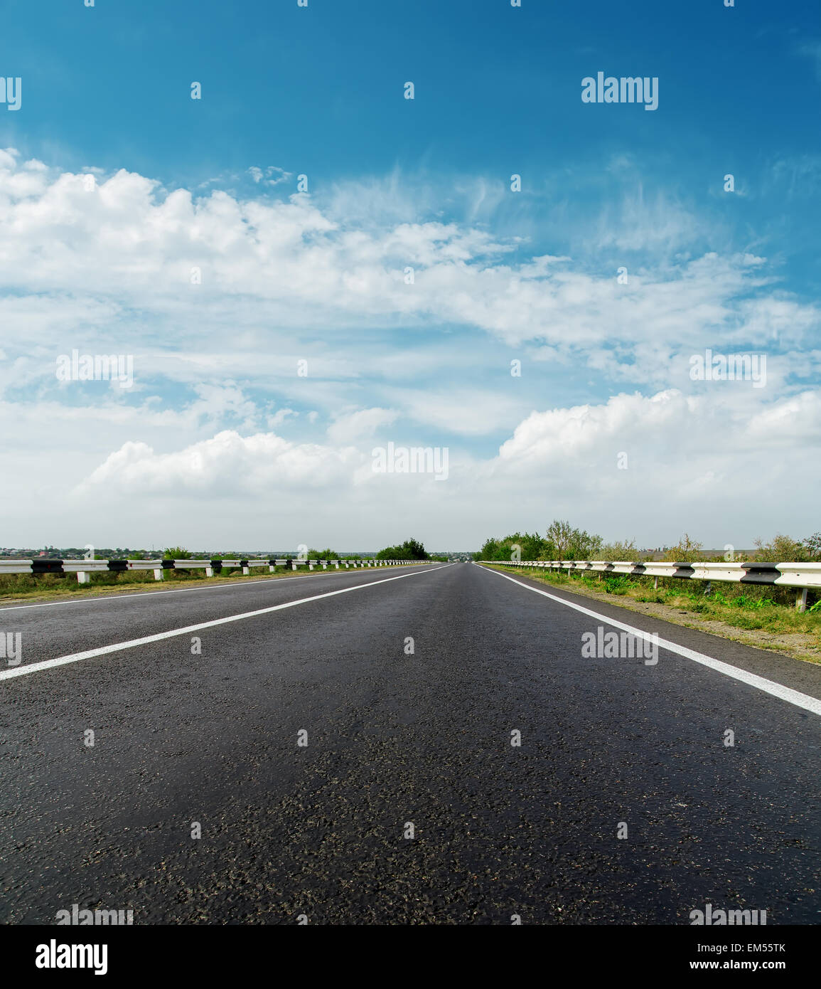 asphalt road and cloudy sky Stock Photo - Alamy