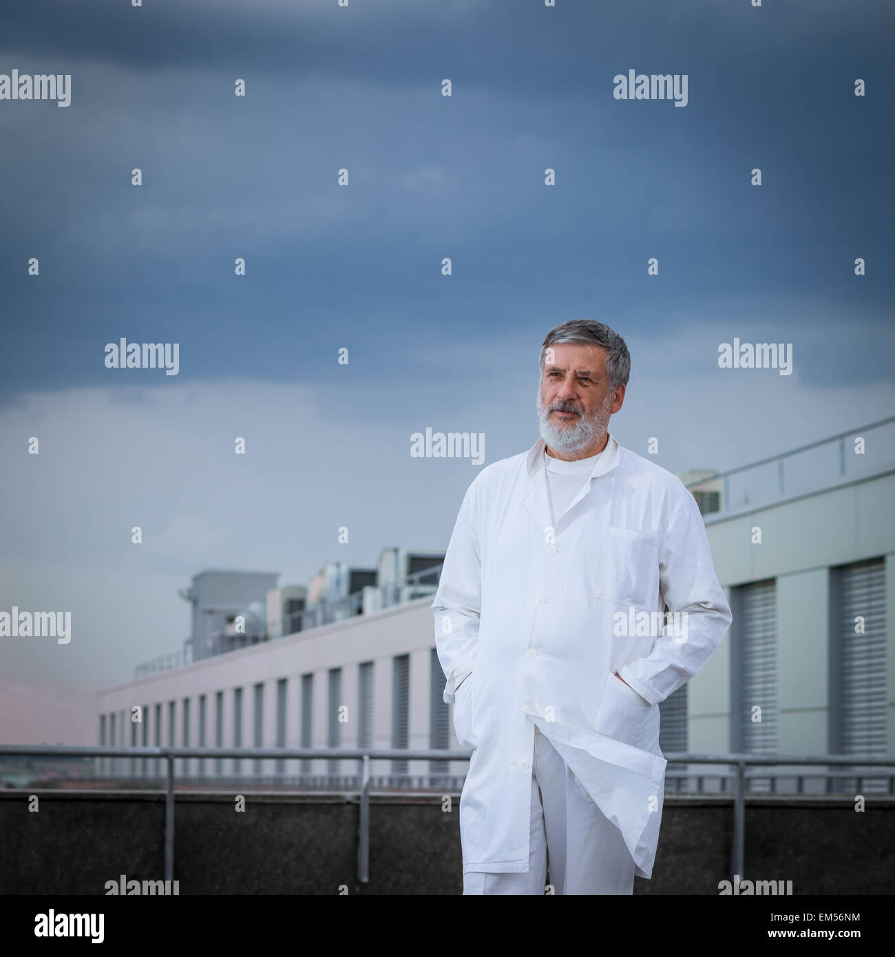 Doctor standing on the roof Stock Photo