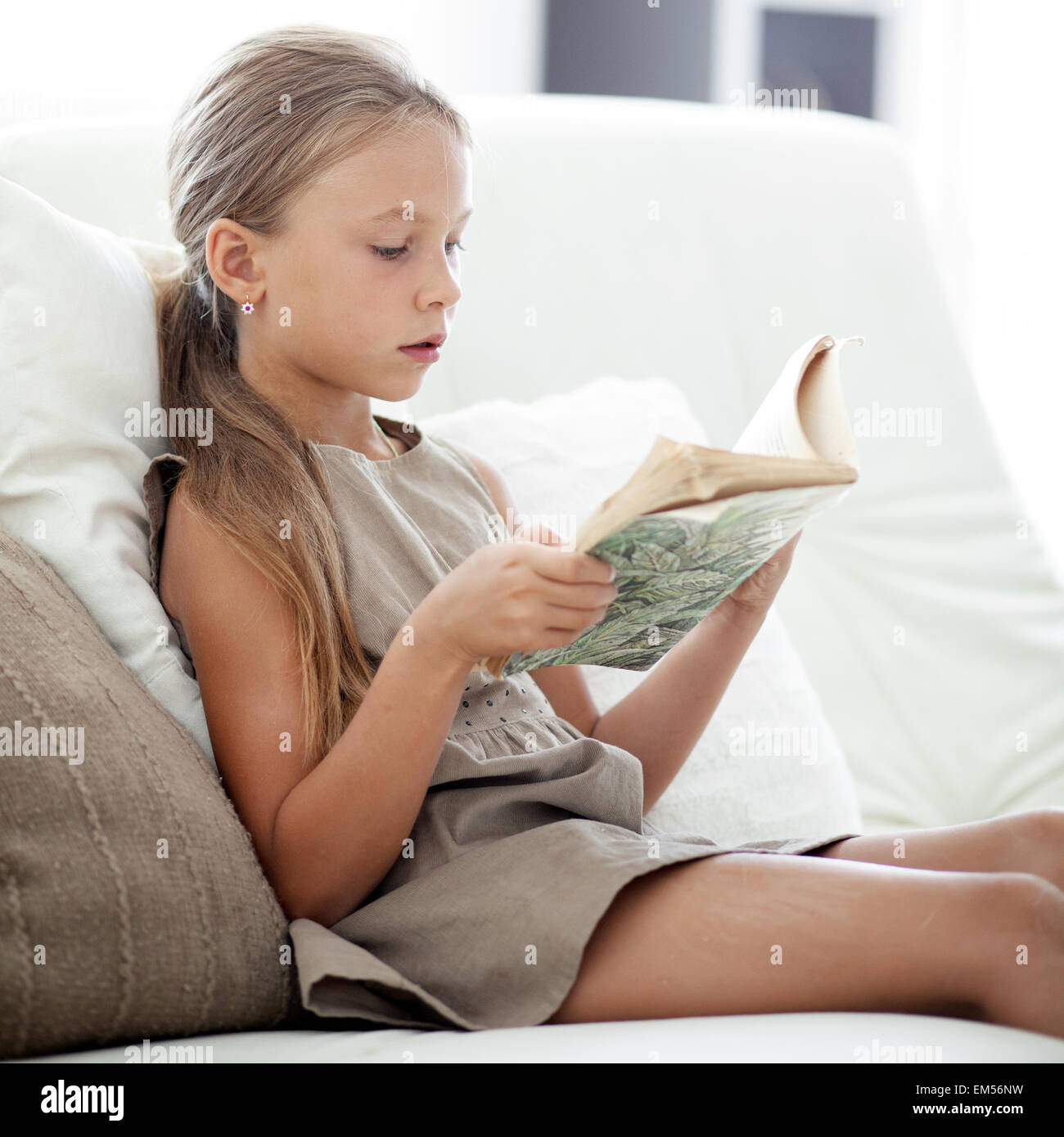 Child reading book Stock Photo