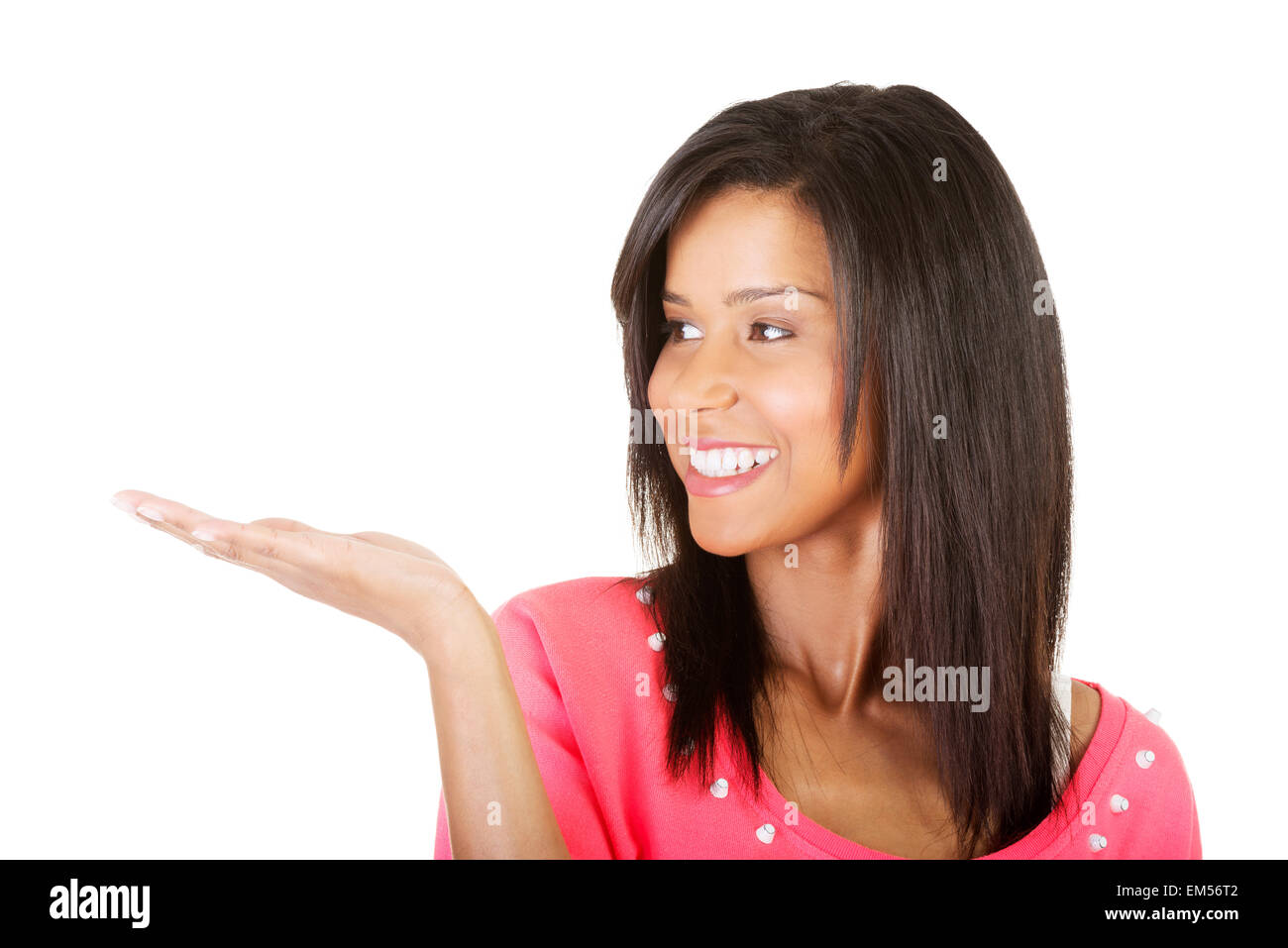 Happy , excited young woman presenting copy space on her palm Stock ...