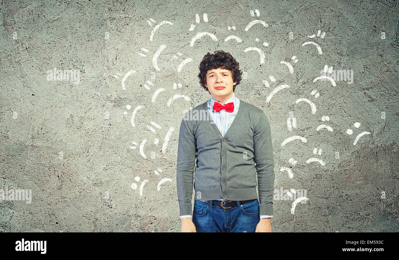 Young upset man Stock Photo - Alamy