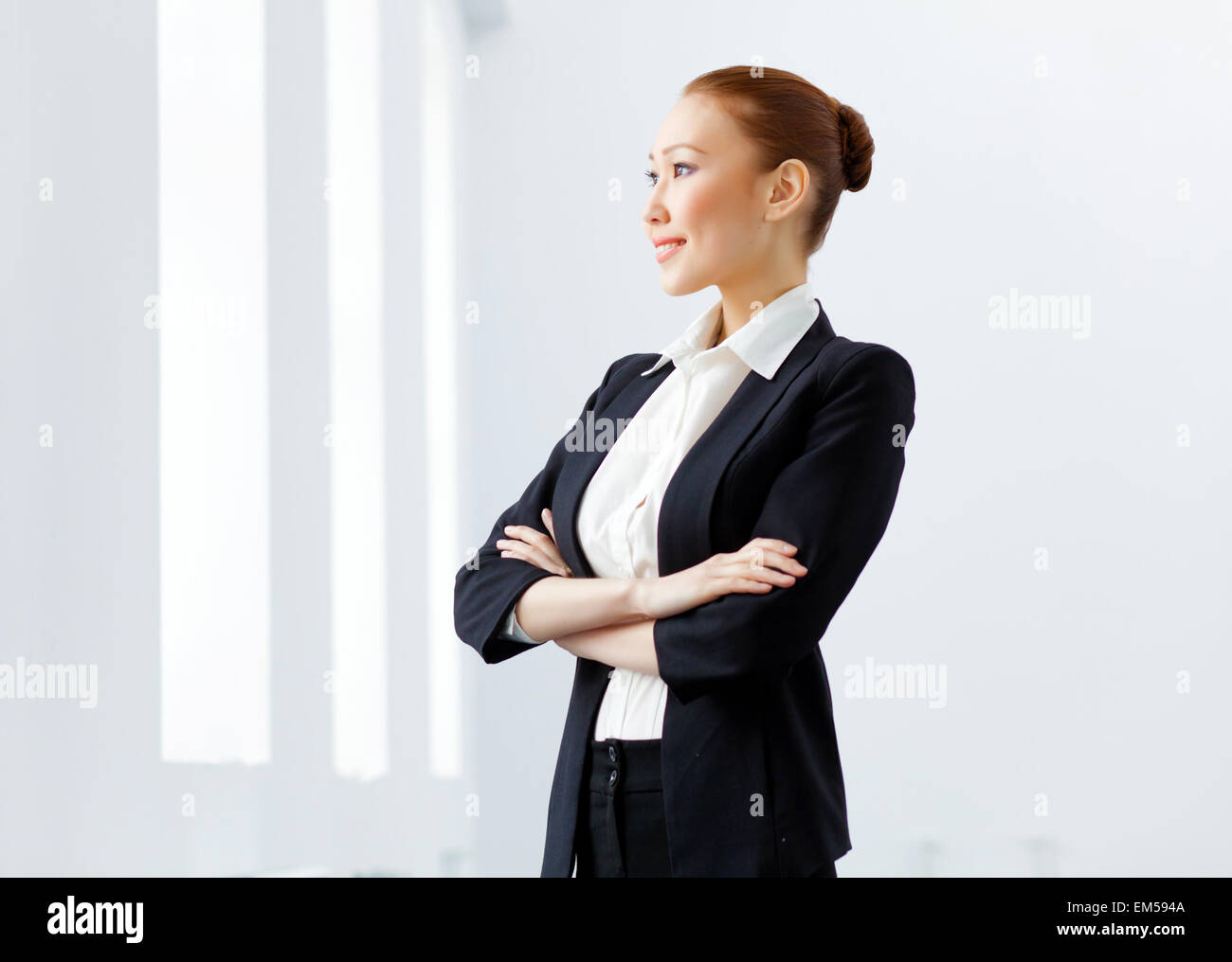 Attractive asian businesswoman in formal suit Stock Photo - Alamy