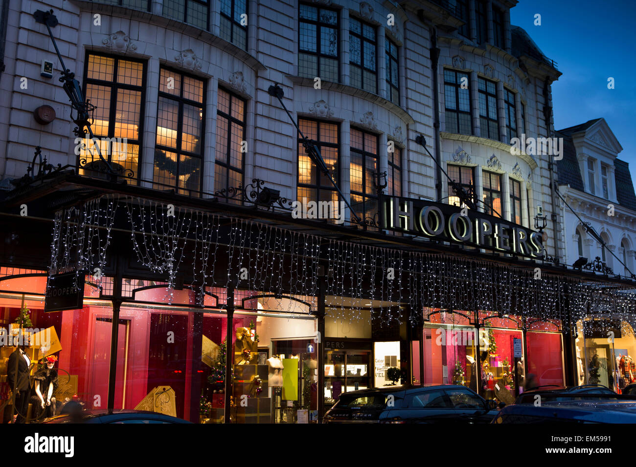 UK, England, Yorkshire, Harrogate at Christmas, James Street, Hoopers department store lit at dusk Stock Photo