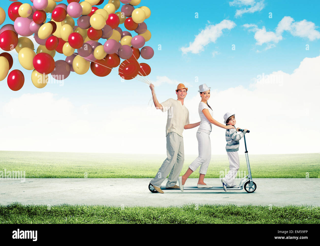 Happy young family Stock Photo - Alamy