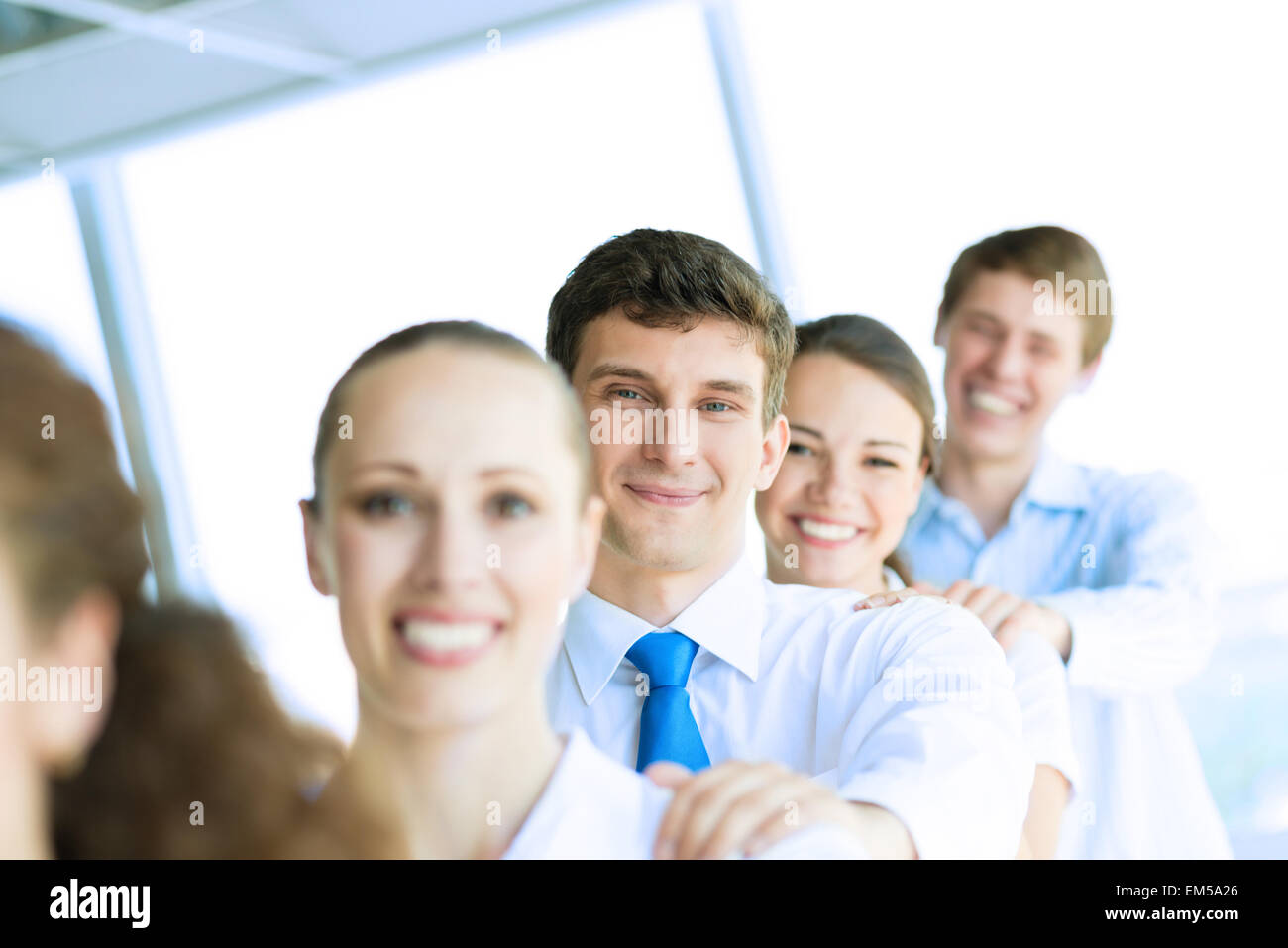 Teamwork smile portrait young hi-res stock photography and images - Alamy