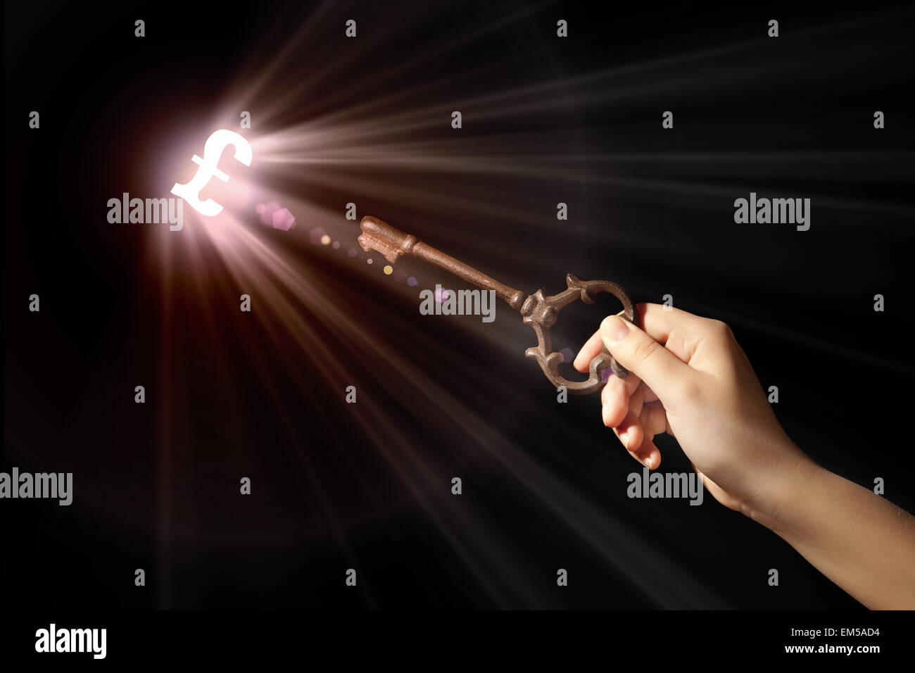 Hand with key Stock Photo - Alamy