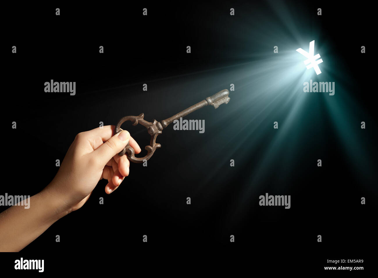 Hand with key Stock Photo - Alamy