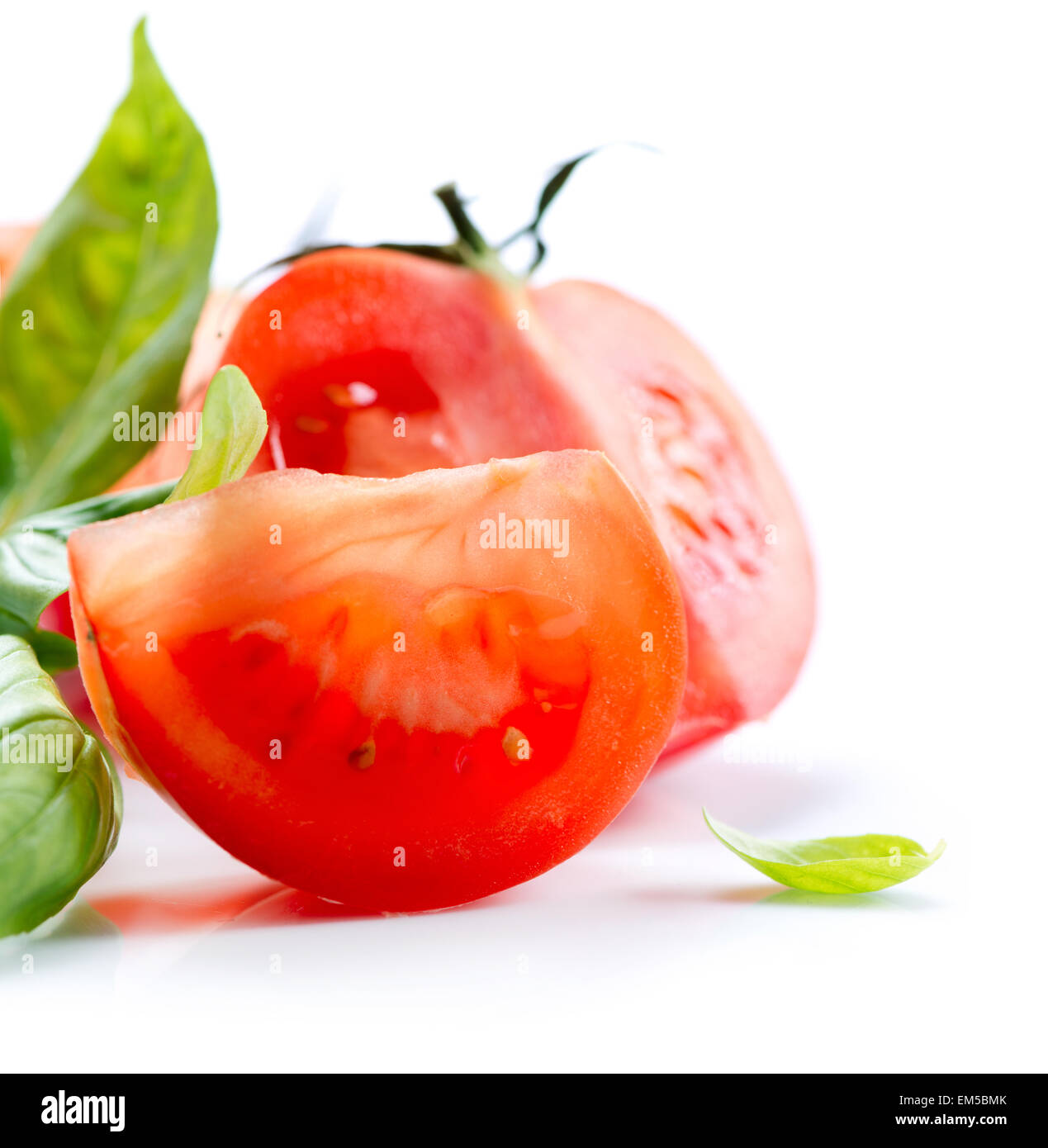 Fresh Tomatoes isolated on a White Background Stock Photo