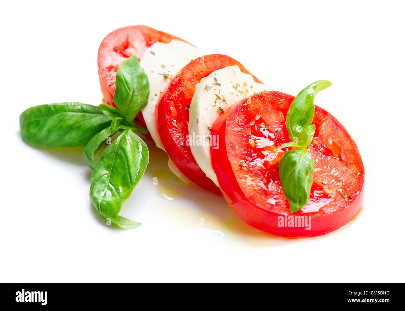 Caprese Salad. Tomato and Mozzarella slices with basil leaves Stock ...