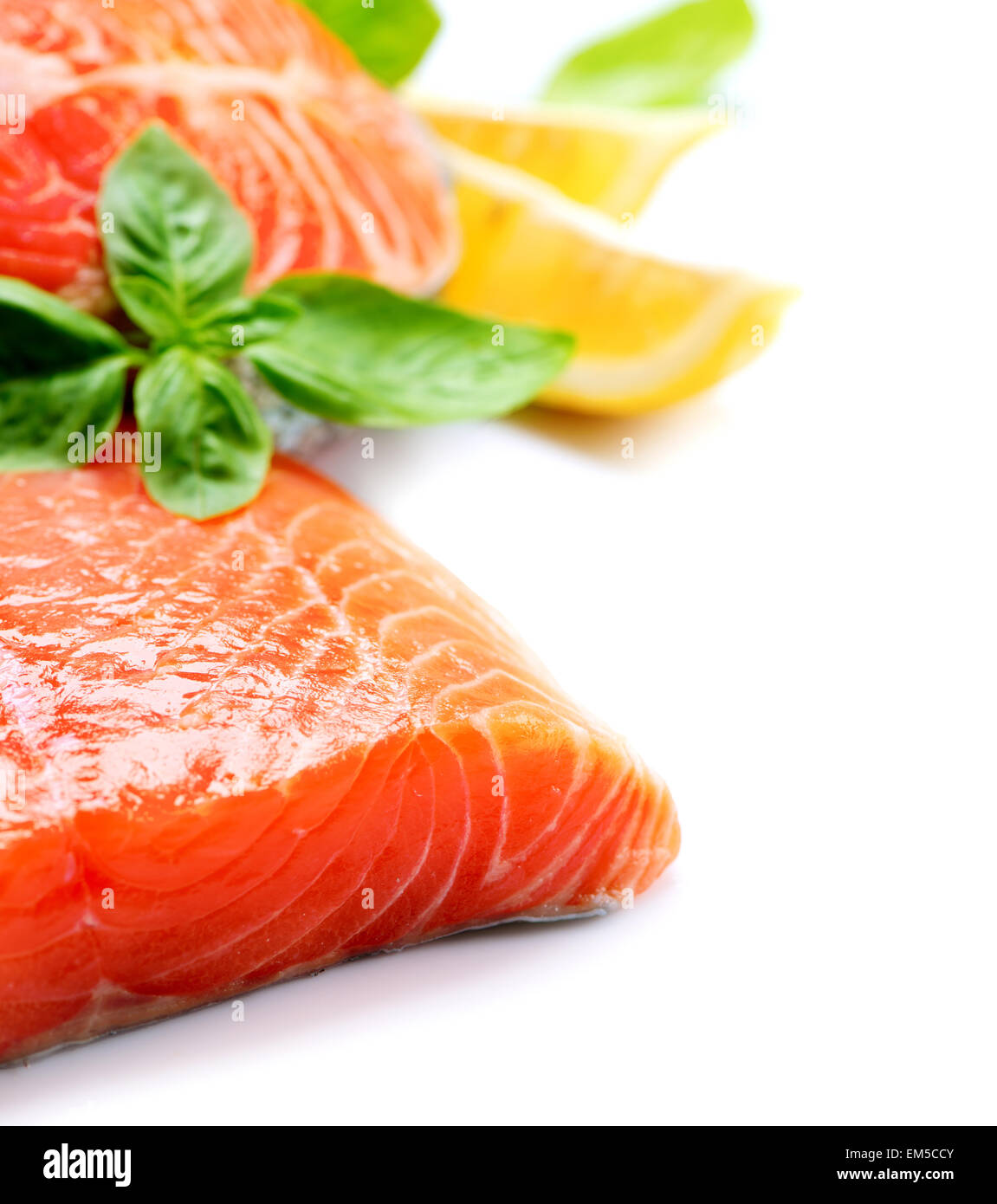 Raw Salmon Red Fish Steak with Herbs and Lemon isolated on White Stock ...