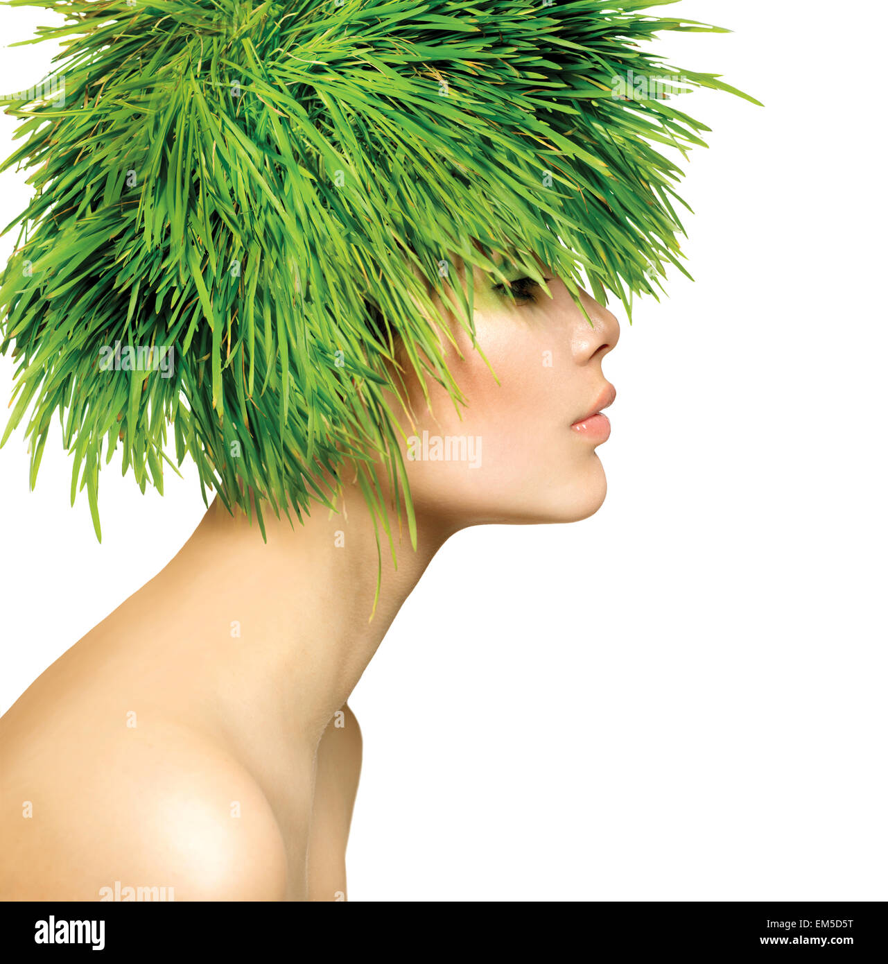 Beauty Spring Woman with Fresh Green Grass Hair Stock Photo
