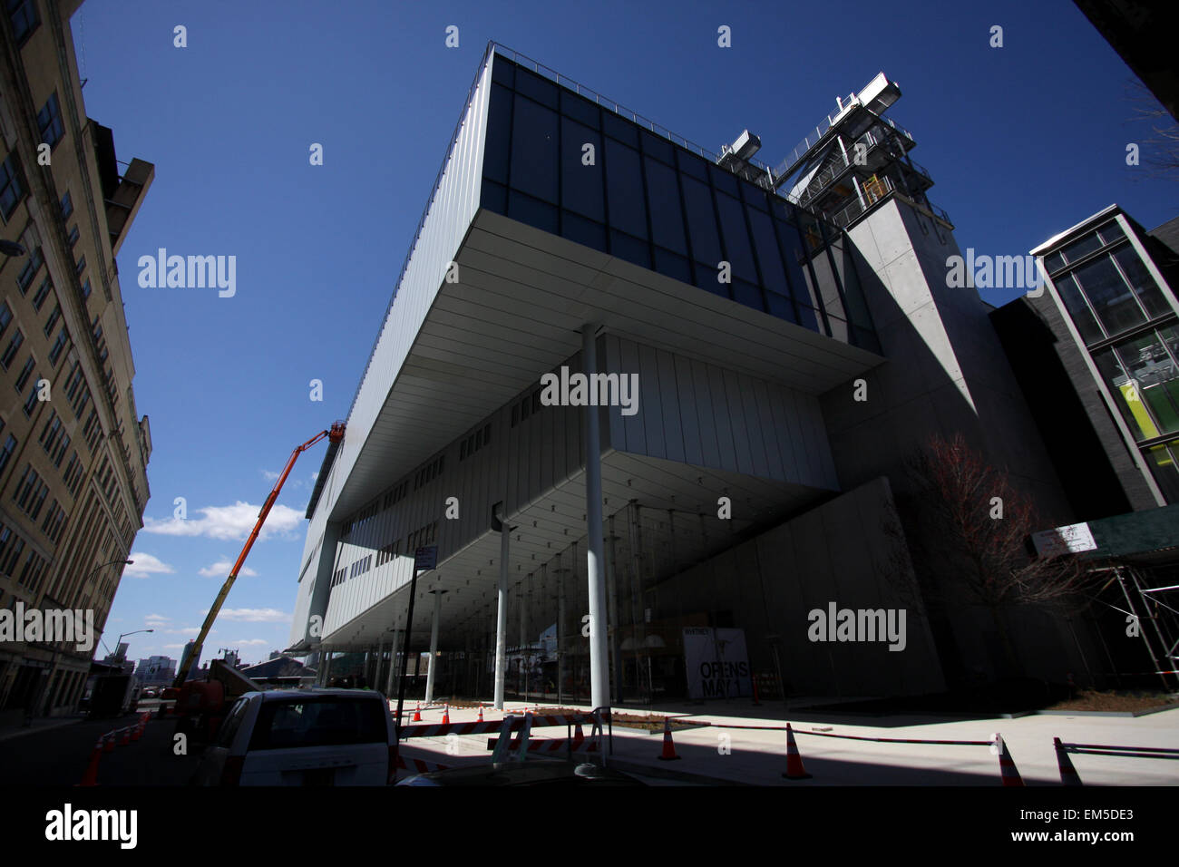 New York, USA. 15th Apr, 2015. Construction workers putting finishing touches on the new Whitney Museum of American Art building at Washington Street and Gansevoort Street, in New York City's Meatpacking District at the end of the High Line.   Designed by architect Renzo Piano, the 200,000-square-foot space will open to the public on May 1st, 2015       London 2012  - Olympics:   Swimming Practice        London 2012  - Olympics:  Diving Practice.        London 2012  - Olympics:  Swimming Practice. Credit:  Adam Stoltman/Alamy Live News Stock Photo
