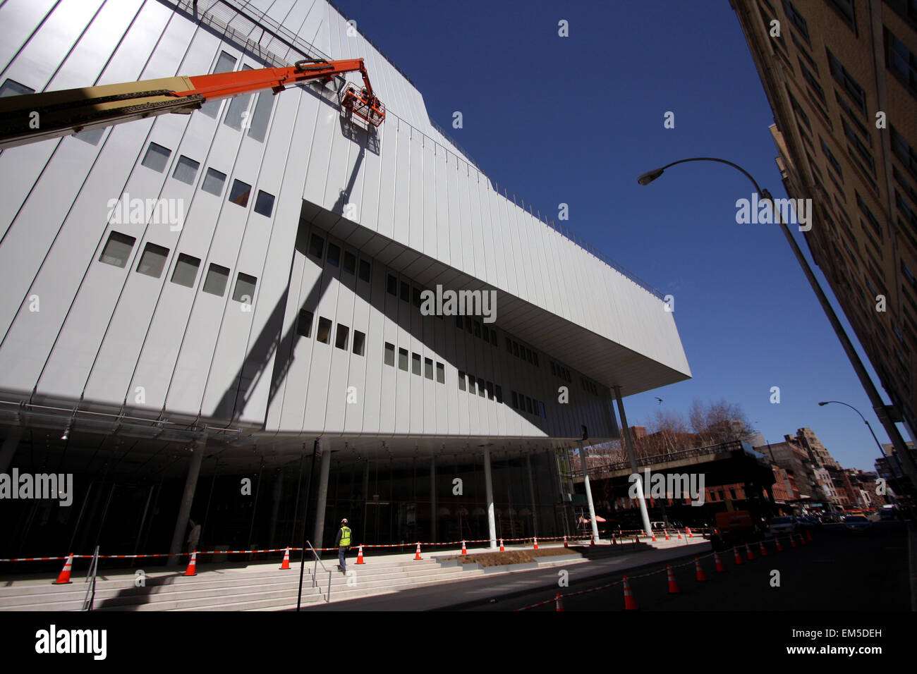New York, USA. 15th Apr, 2015. Construction workers putting finishing touches on the new Whitney Museum of American Art building at Washington Street and Gansevoort Street, in New York City's Meatpacking District at the end of the High Line.   Designed by architect Renzo Piano, the 200,000-square-foot space will open to the public on May 1st, 2015        London 2012  - Olympics:   Swimming Practice        London 2012  - Olympics:  Diving Practice.        London 2012  - Olympics:  Swimming Practice. Credit:  Adam Stoltman/Alamy Live News Stock Photo