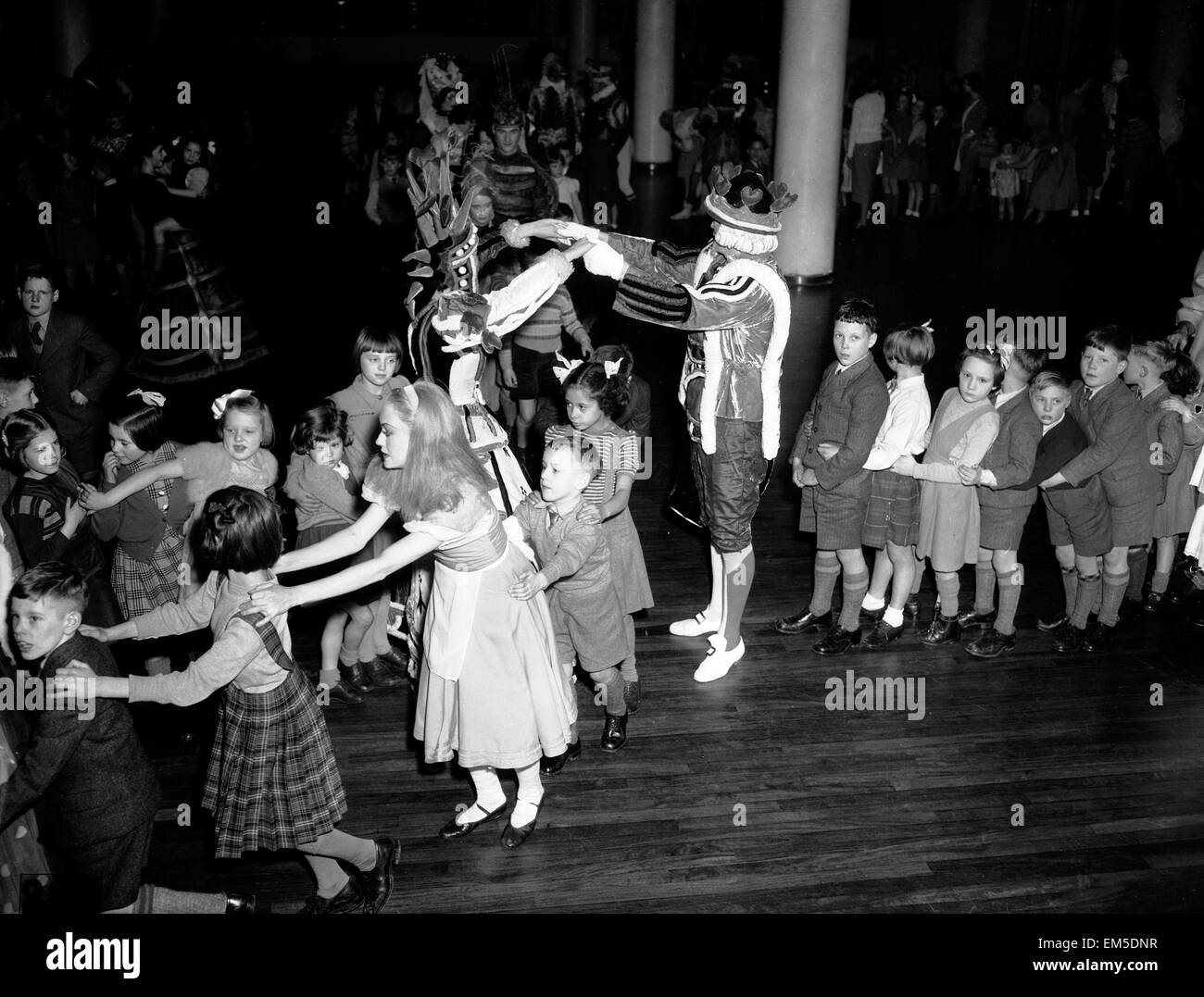 Mad Hatter's tea party. 22nd December 1953. Stock Photo