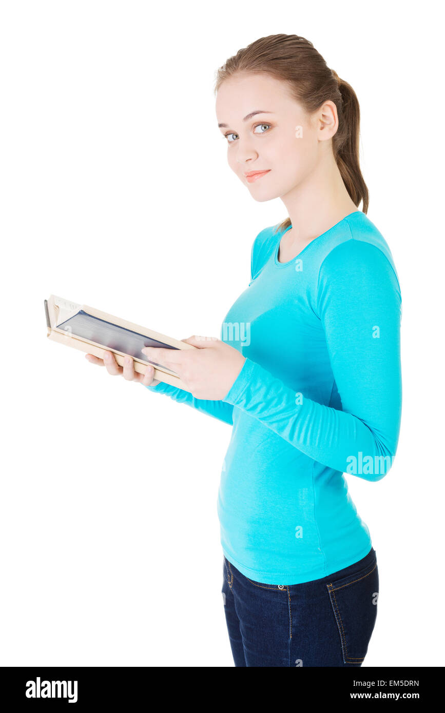 Young woman reading an old book Stock Photo