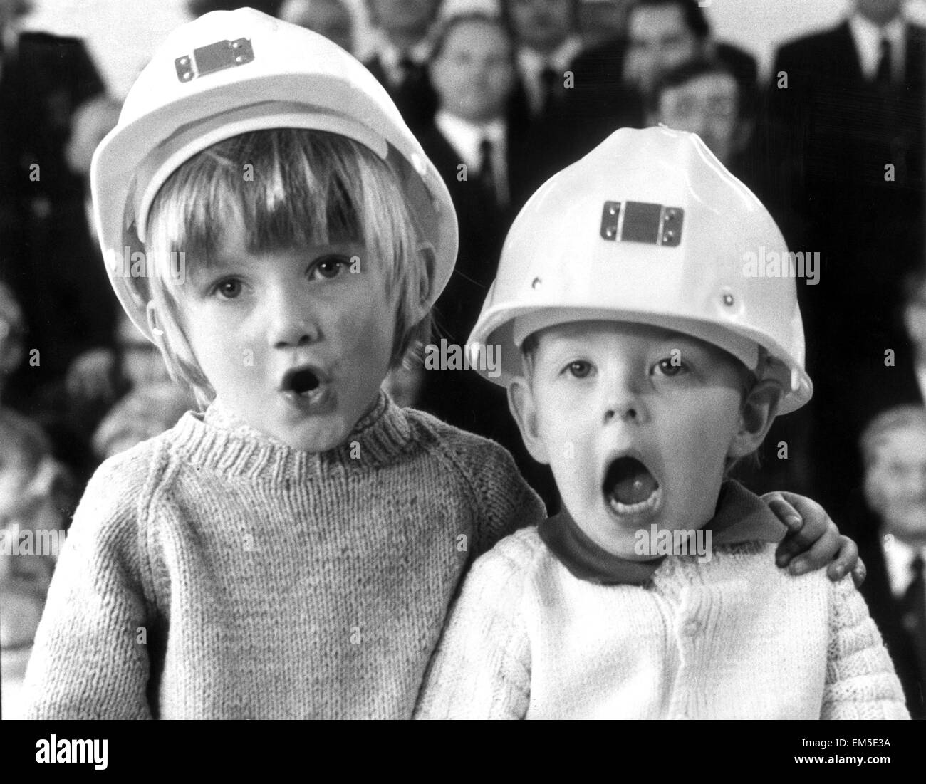 Jonathan Allen, aged 3 and four year old William Walker join in with the Blaenavon Male Voice Choir, made up mostly of miners of the Brecon Beacons, during rehearsals at a local school. 5th April 1977. Stock Photo