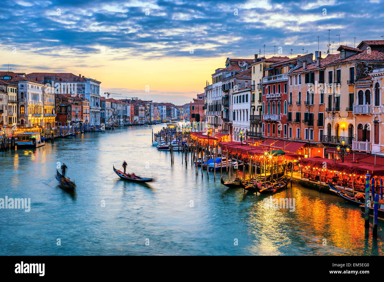 gondolas at sunset in Venice Stock Photo - Alamy
