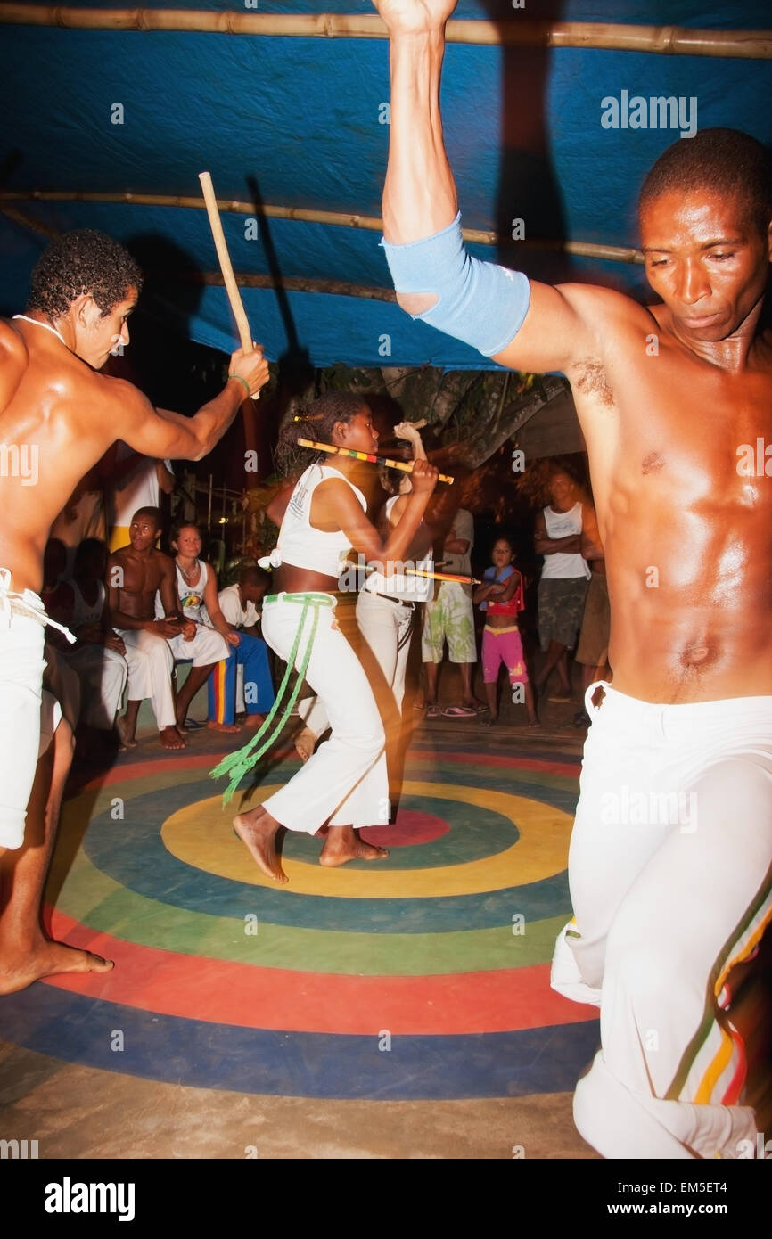 Young people practicing Brazilian dance and martial arts form of Capoeira; Itacare, Bahia