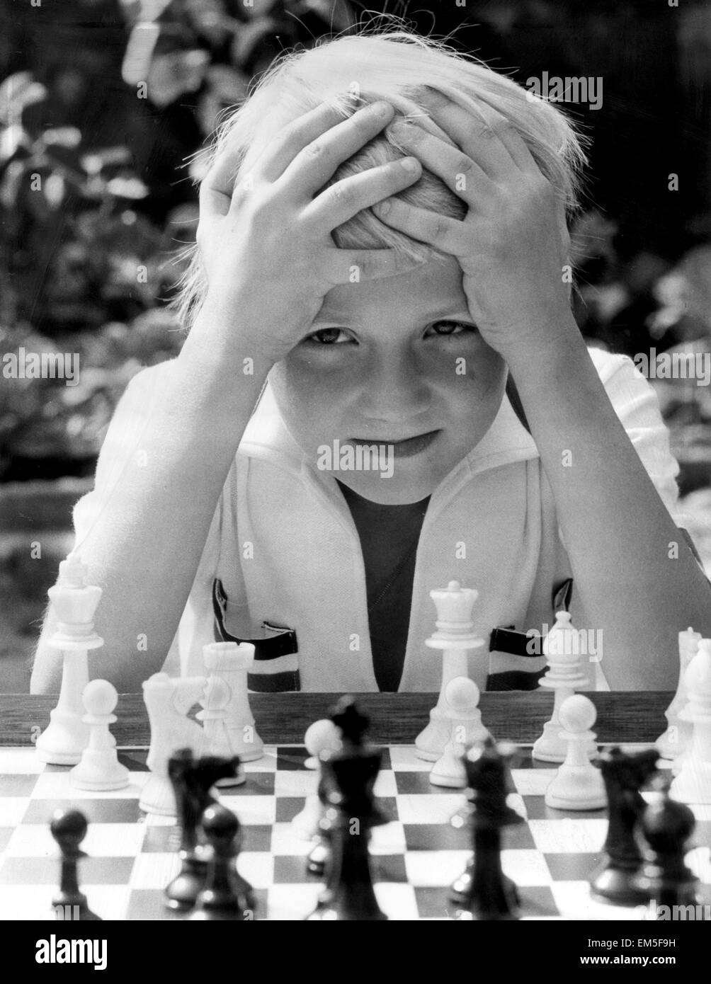 Eight year old Neil Carr of Barking, soon to become England's youngest ever chess international. 26th August 1976. Stock Photo