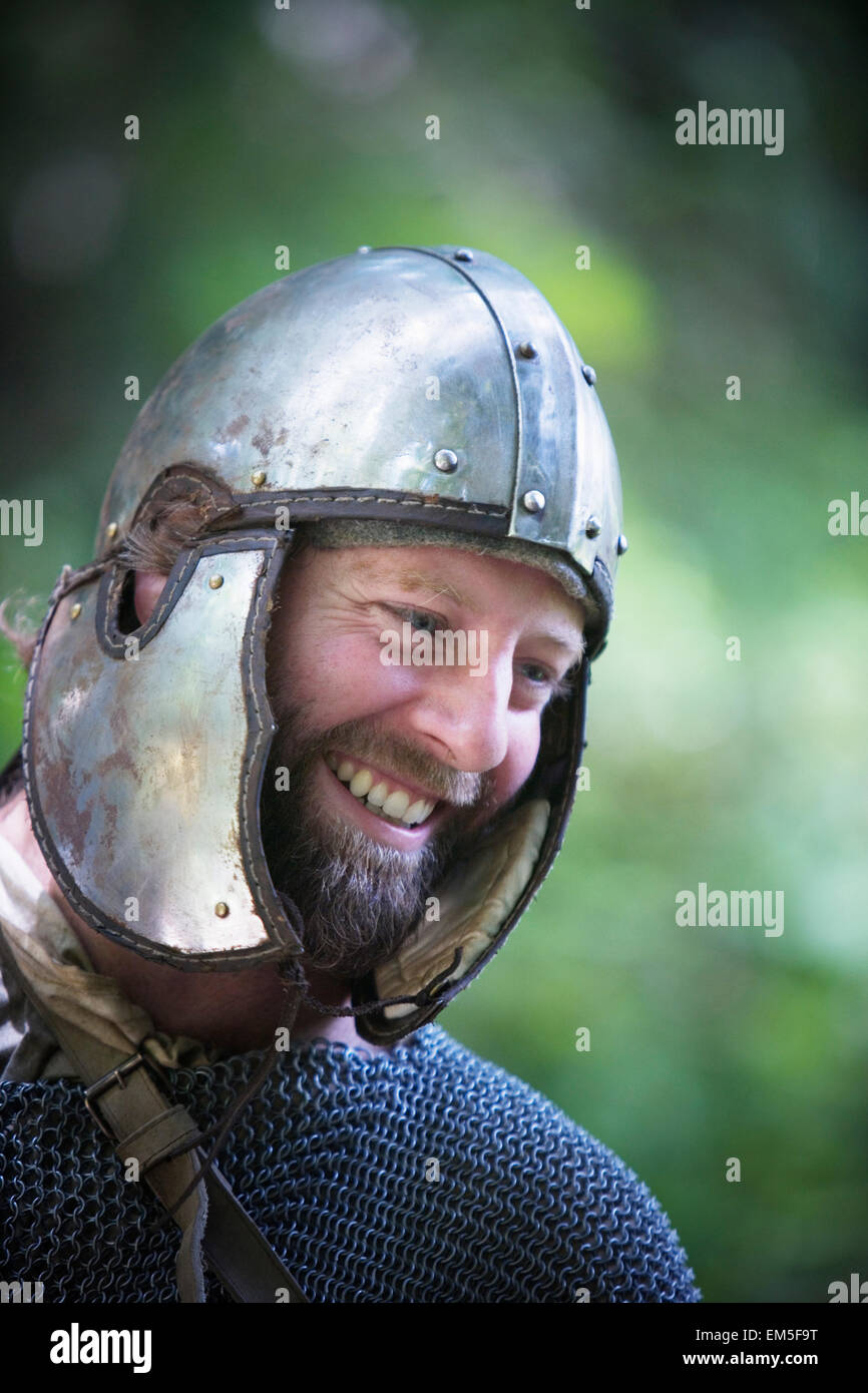 A man with a Gladiator helmet on his head. Stock Photo