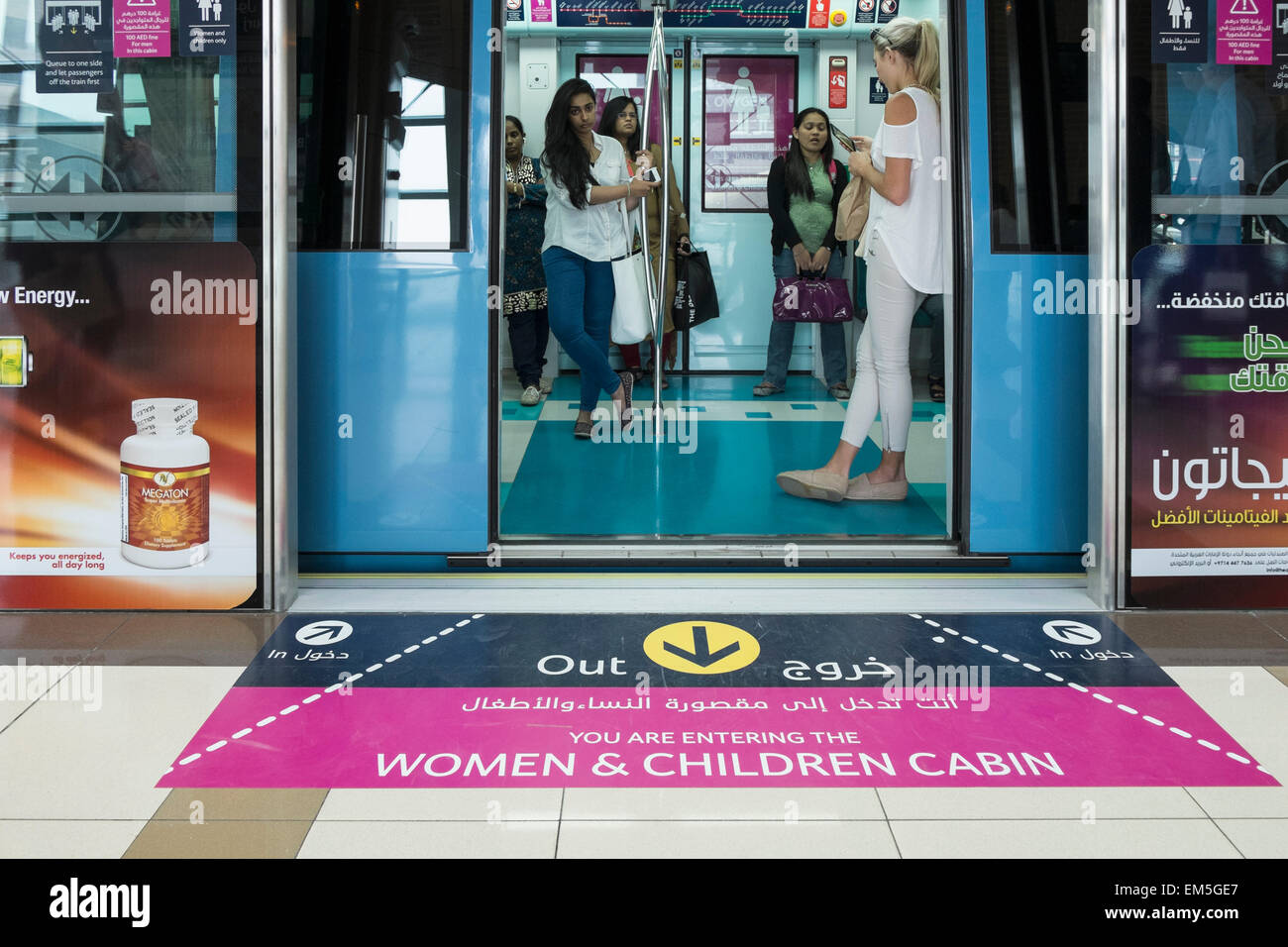 Female passengers in women only carriage on metro train in Dubai United Arab Emirates Stock Photo