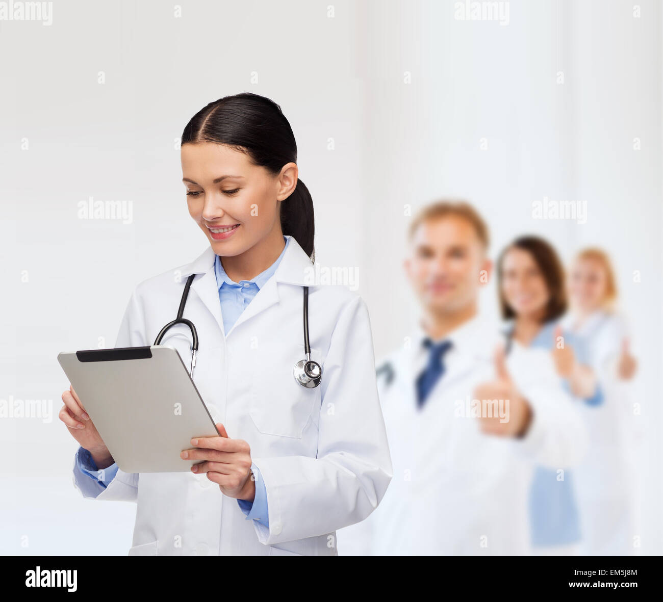 Friendly hispanic female doctor hi-res stock photography and images - Alamy