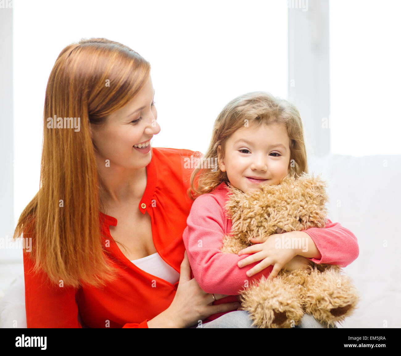 happy mother and child with teddy bear at home Stock Photo - Alamy