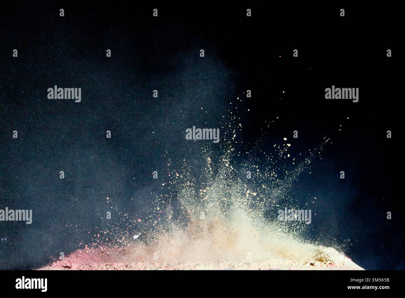 red powder paint explosion Stock Photo - Alamy