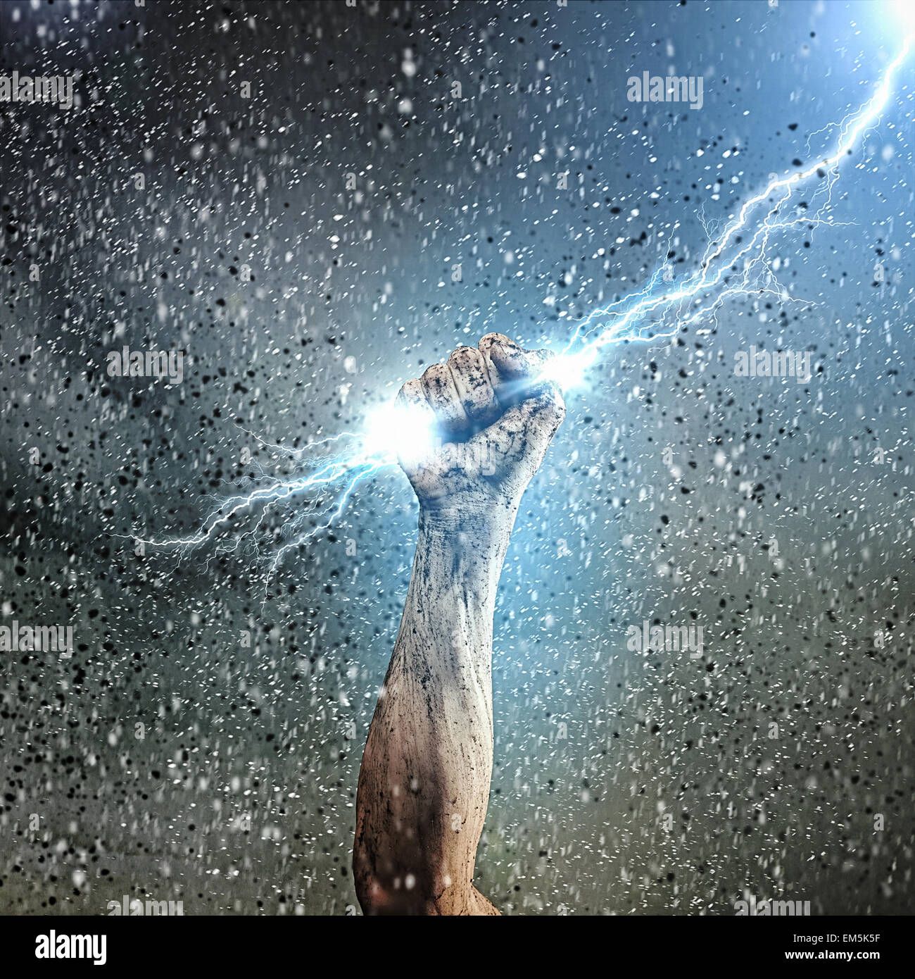 Human hand holding lightning Stock Photo - Alamy