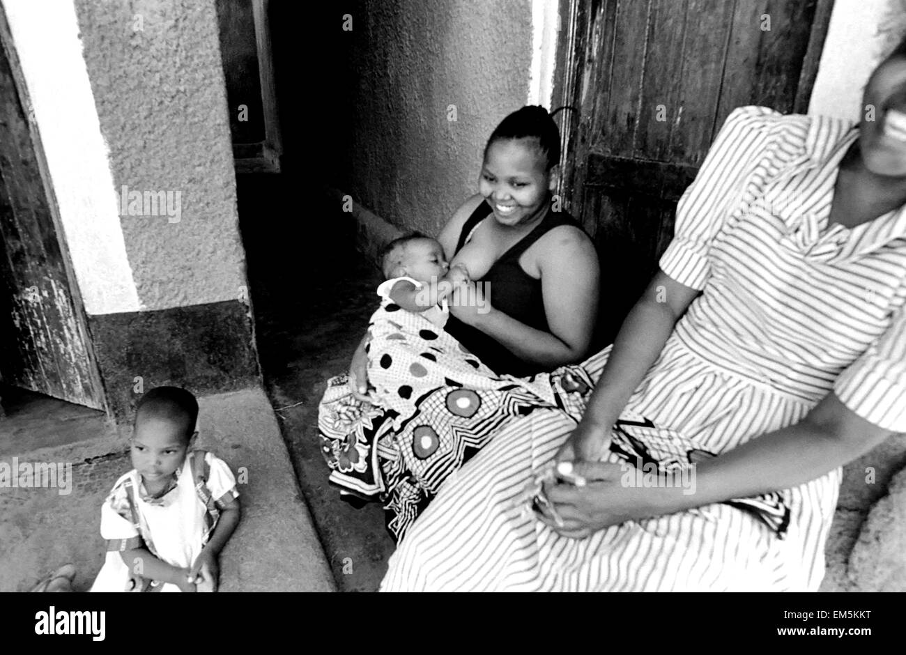 Ikutha, Kitui, Kenya. A woman breastfeeding her child. The economy is based Ikutha in retail, cattle, and little agriculture. Wo Stock Photo