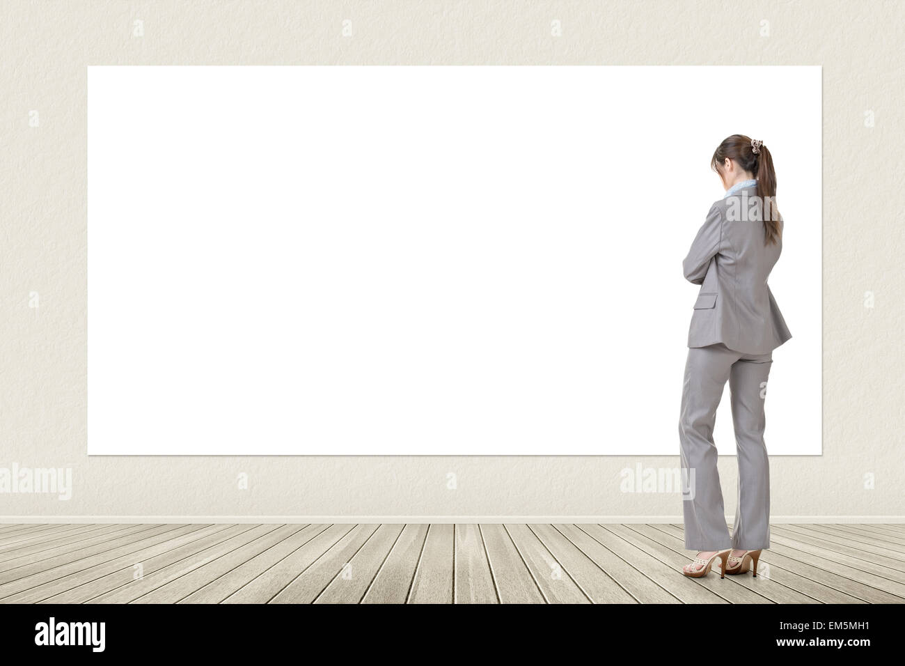Asian business woman looking at blank banner Stock Photo - Alamy
